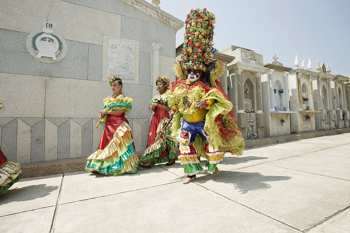 Performers with painted faces in the Barranquilla parade