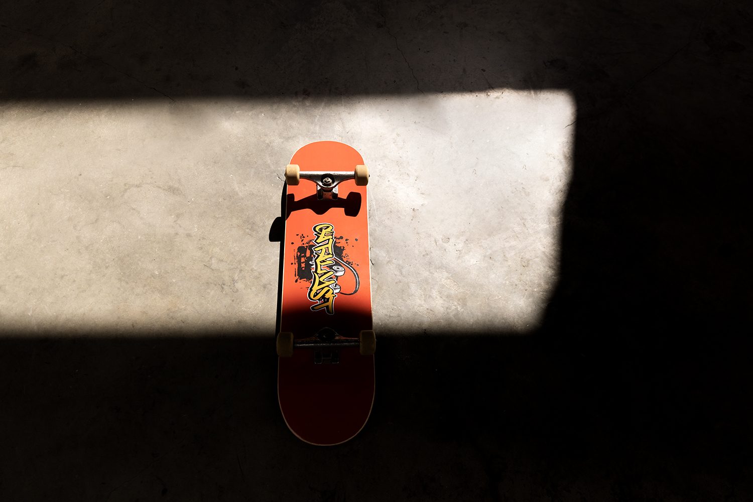 A board lit by a shaft of hard sunlight