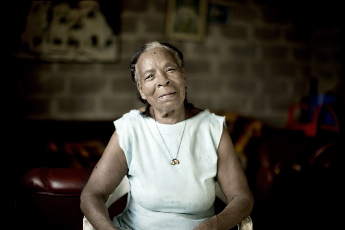 Portrait of a woman from Lloró, lit by a doorway