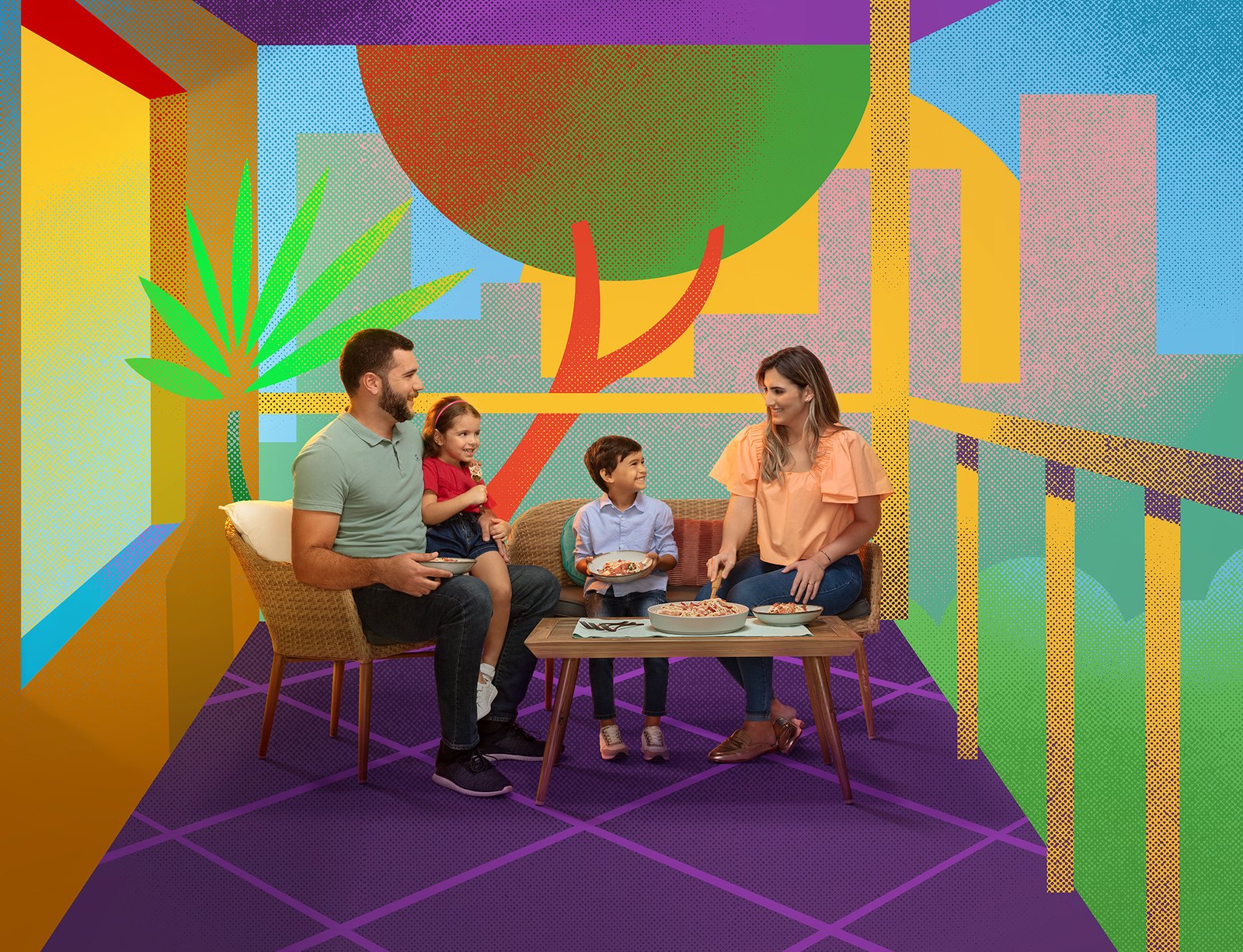 A family seated at a low table inside a flat geometric room of purple, orange and green