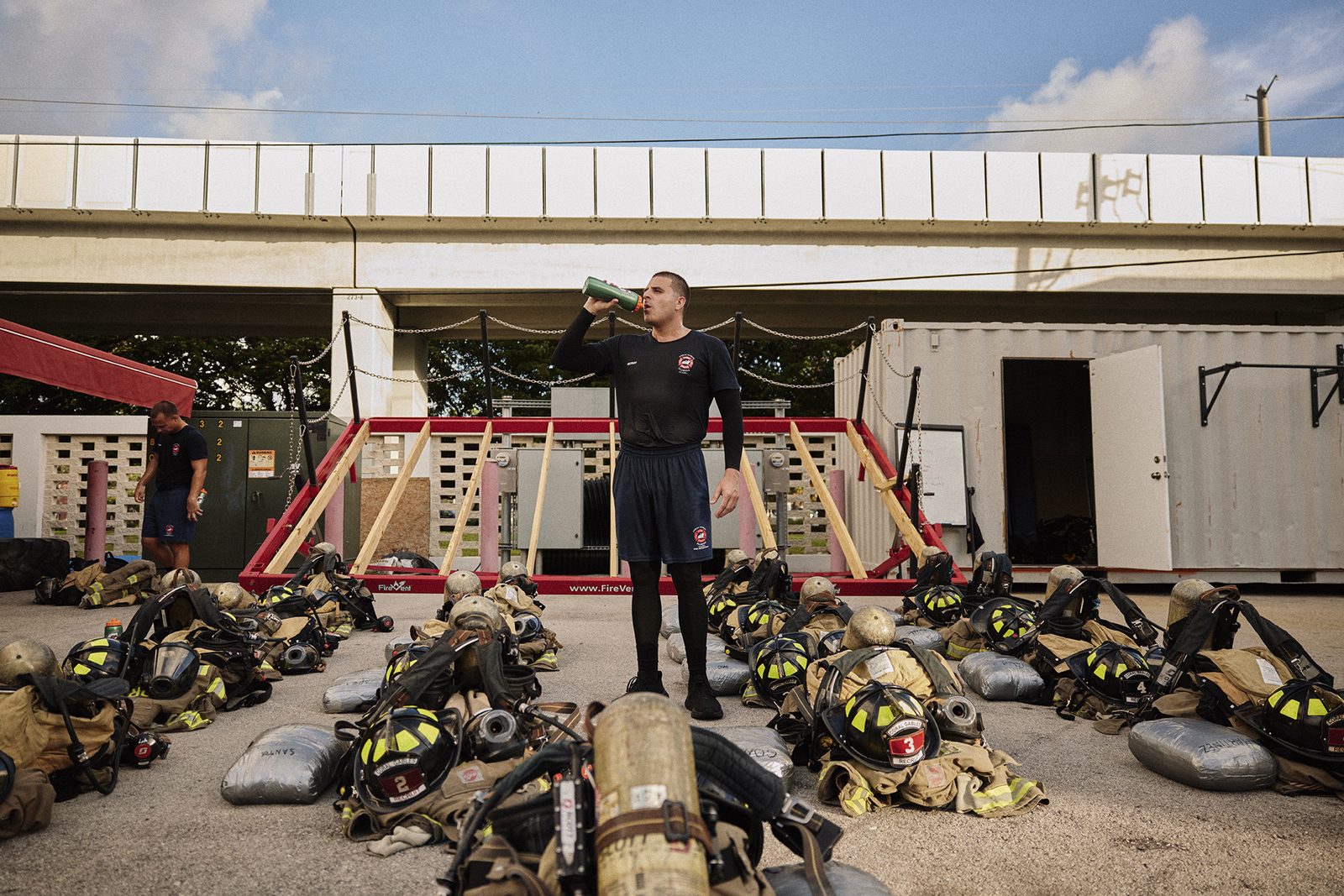 Firefighters gather in the Miami afternoon light