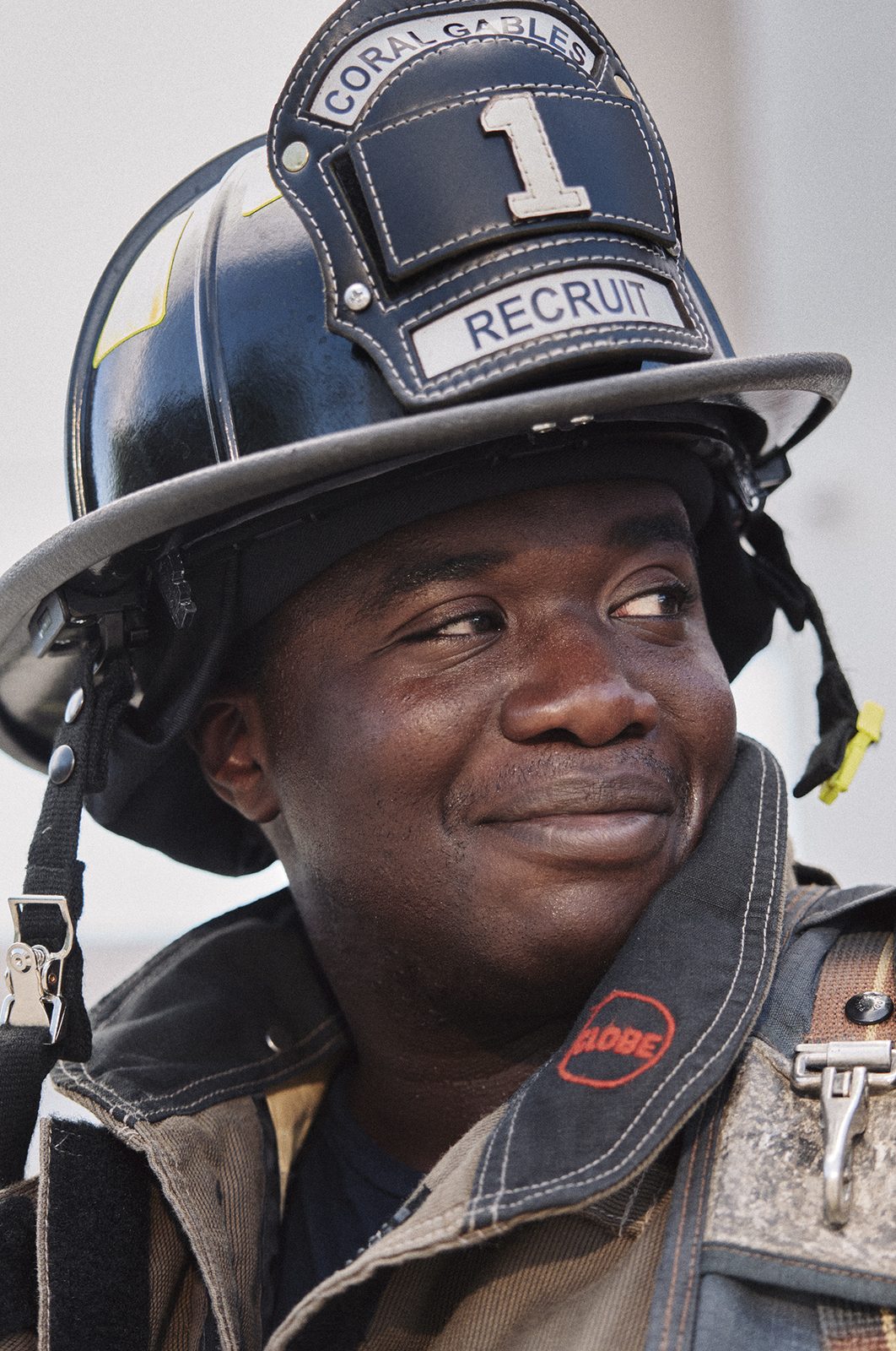 Firefighter with breathing apparatus, mid-portrait