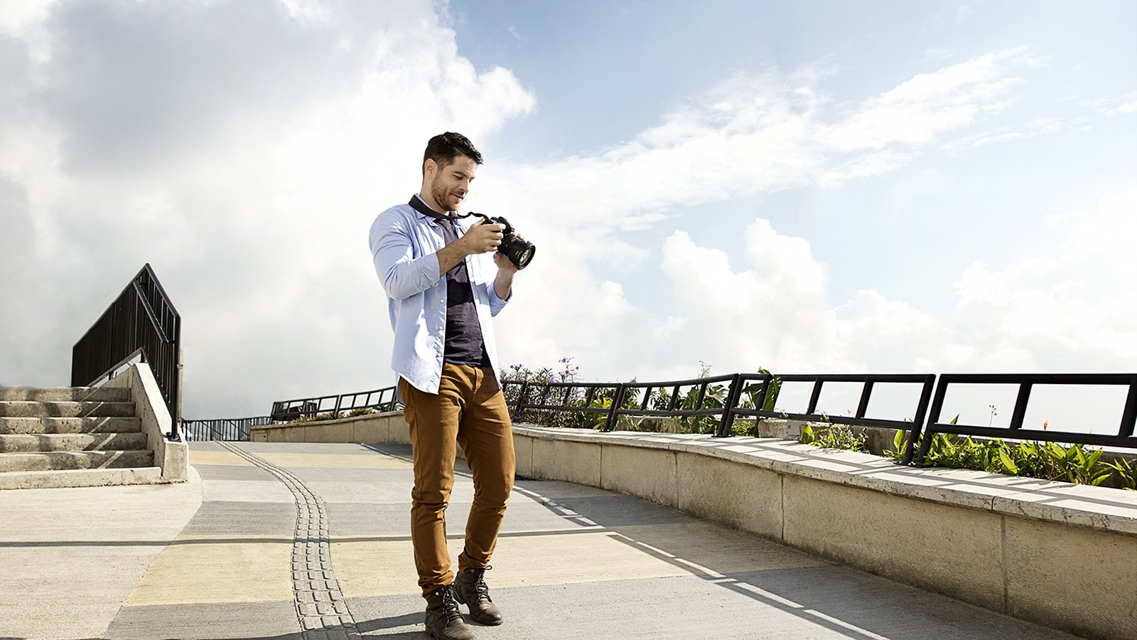 Visa in Medellín: Lifestyle Photography Against Real Architecture